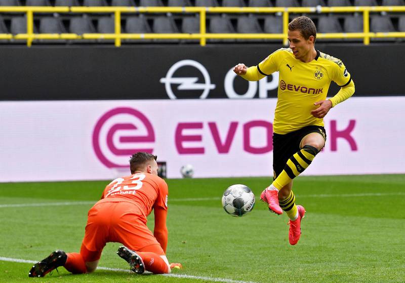 Dortmund's Thorgan Hazard scores their third goal. Reuters