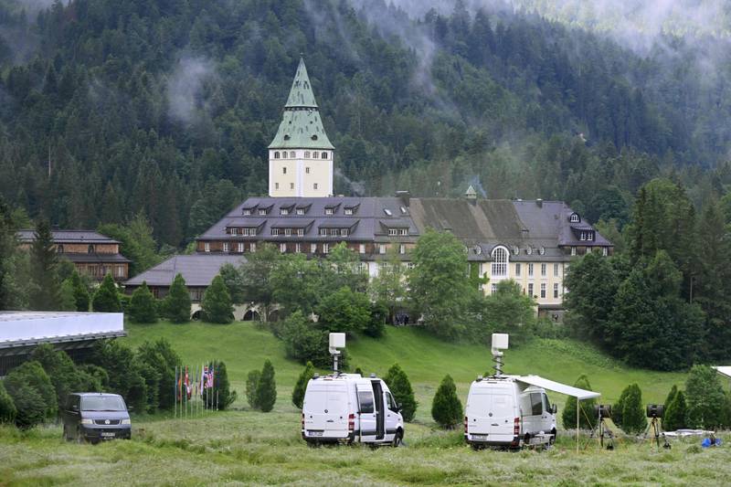 Vans equipped with electronic detection devices are stationed in front of Elmau Castle, where the G7 summit is taking place. AFP