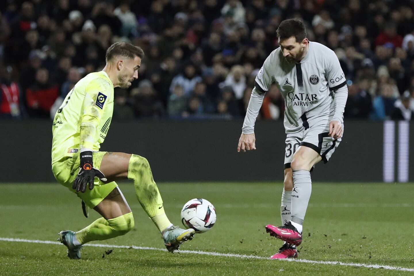 Paris Saint Germain's Lionel Messi, right, scores to make it 2-0 against Montpellier. EPA
