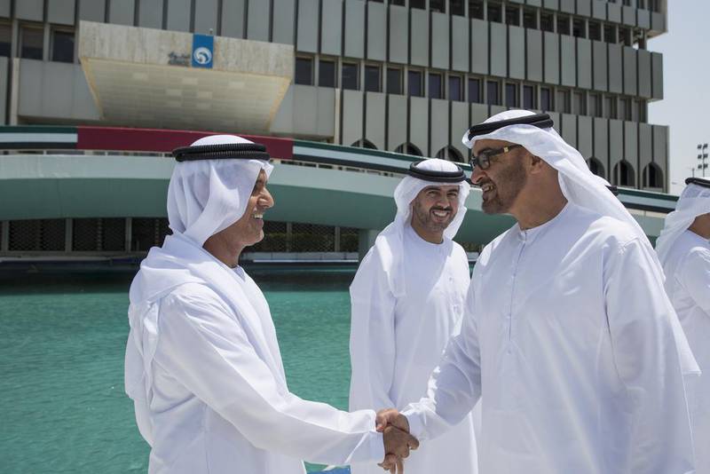 Sheikh Mohammed bin Zayed, Crown Prince of Abu Dhabi and Deputy Supreme Commander of the Armed Forces, is greeted by Ali Khalifa Al Shamsi, director of strategy and Coordination at Adnoc, during his visit at the company's headquarters. Ryan Carter / Crown Prince Court – Abu Dhabi