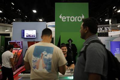 eToro, which has about 30 million registered users globally, recently opened its office in Abu Dhabi, from where it plans to expand in the region. Getty Images / AFP