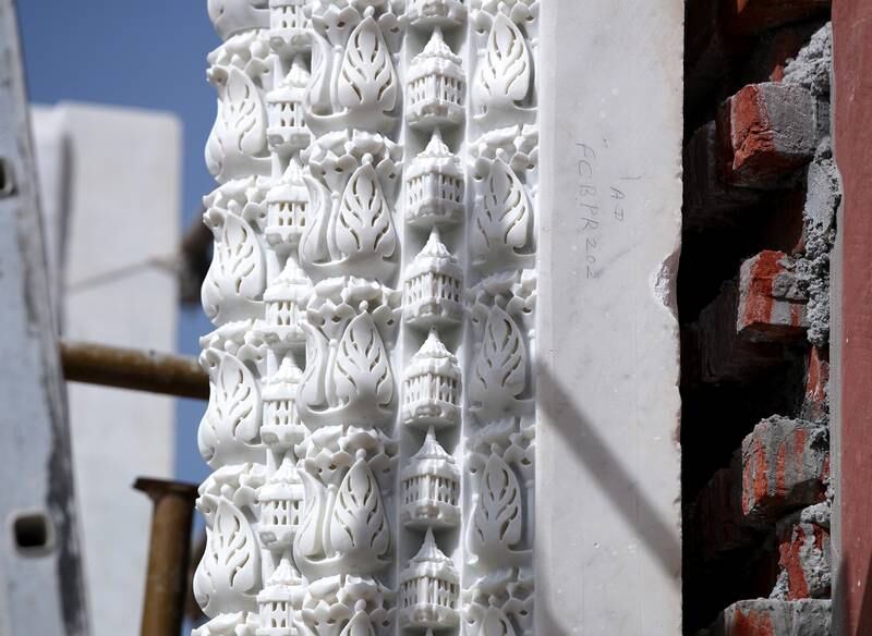 The first hand-carved marble sculptures are being installed in the temple's main prayer hall. Victor Besa / The National