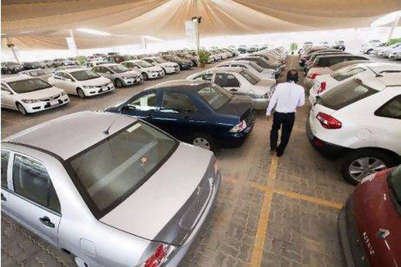 Nissan's huge used car lot outside its Sheikh Zayed Road showroom in Dubai has covered parking spaces for 300 vehicles, including Renaults, Mitsubishis and Hondas, which are sold alongside approved Nissan cars. Jaime Puebla / The National