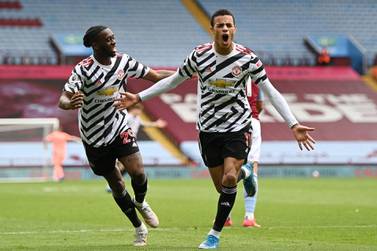 Manchester United's English striker Mason Greenwood (R) celebrates scoring their second goal during the English Premier League football match between Aston Villa and Manchester United at Villa Park in Birmingham, central England on May 9, 2021. RESTRICTED TO EDITORIAL USE. No use with unauthorized audio, video, data, fixture lists, club/league logos or 'live' services. Online in-match use limited to 120 images. An additional 40 images may be used in extra time. No video emulation. Social media in-match use limited to 120 images. An additional 40 images may be used in extra time. No use in betting publications, games or single club/league/player publications. / AFP / POOL / Shaun Botterill / RESTRICTED TO EDITORIAL USE. No use with unauthorized audio, video, data, fixture lists, club/league logos or 'live' services. Online in-match use limited to 120 images. An additional 40 images may be used in extra time. No video emulation. Social media in-match use limited to 120 images. An additional 40 images may be used in extra time. No use in betting publications, games or single club/league/player publications.