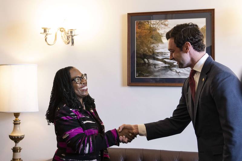 Supreme Court nominee Ms Brown Jackson meets Senator Jon Ossoff, a Democrat representing Georgia, in his office on Capitol Hill in Washington. Getty / AFP