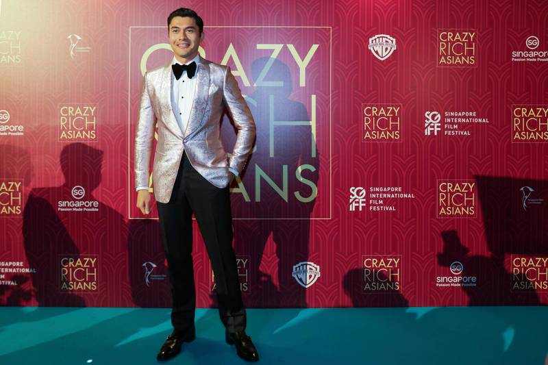 Actor Henry Golding poses as he arrives for the red carpet screening of the movie 'Crazy Rich Asians'. Don Wong / AP photo