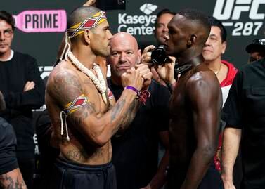 UFC 287 middleweight champion Alex Pereira, left, faces challenger Israel Adesanya after a ceremonial weigh-in Friday, April 7, 2023, in Miami.  Pereira will defend his title against Adesanya on Saturday.  (AP Photo / Marta Lavandier)