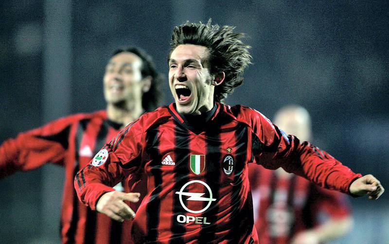 TO GO WITH AFP STORY - FILES - Andrea Pirlo of Ac Milan jubilates after scoring the winning goal against Atalanta 05 march 2005 at Bergamo's Atleti azzurri d'Italia Stadium during their italian Serie A match.       AFP PHOTO/ Filippo MONTEFORTE (Photo by FILIPPO MONTEFORTE / AFP)