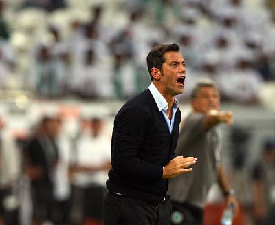 Abu Dhabi,United Arab Emirates- May,28, 2013:   Al Ahli coach Enrique Sanchez Flores gestures during their match  against Al Shabab in the President's Cup final at the  Jazira Mohamed Bin Zayed Stadium in AbuDhabi.  (  Satish Kumar / The National ) For Sports