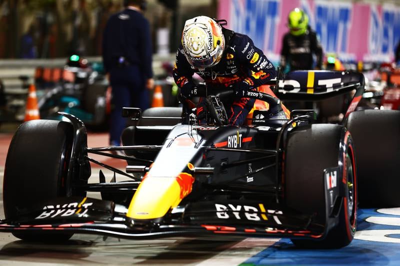 BAHRAIN, BAHRAIN - MARCH 19: Second place qualifier Max Verstappen of the Netherlands and Oracle Red Bull Racing climbs from his car in parc ferme during qualifying ahead of the F1 Grand Prix of Bahrain at Bahrain International Circuit on March 19, 2022 in Bahrain, Bahrain. (Photo by Mark Thompson / Getty Images)