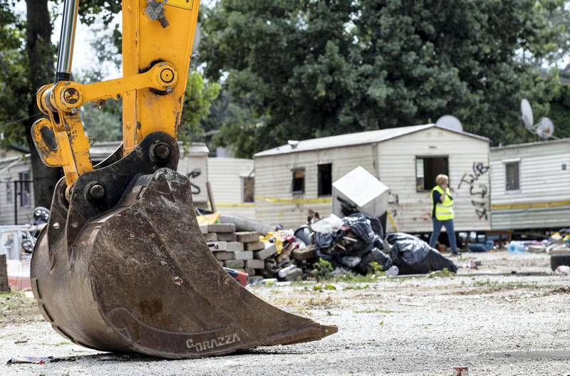 Mandatory Credit: Photo by MASSIMO PERCOSSI/EPA-EFE/Shutterstock (9771930a)A general view shows the mechanic shovel of an excavator machine during the removal of the last housing modules at the 'Camping River' Roma camp in Rome, Italy, 27 July 2018. Rome Mayor Virginia Raggi on 26 July hailed the clearance and closure of the Camping River Roma camp in the Italian capital. The European Court of Human Rights (ECHR) had called for the clearance of the site to be suspended after an appeal by three inhabitants. The Rome city council informed the court about the issue and said that the clearance was necessary due to public health risks.Clearing of gypsy camp in Rome, Italy - 27 Jul 2018