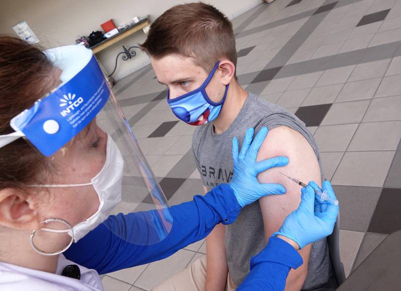 A student receives a dose of a Covid-19 vaccine at the University of Memphis in Tennessee.  Reuters