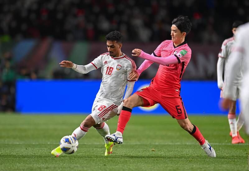 Abdullah Ramadan fights for the ball in South Korea. Photo: UAE FA