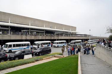Buses wait outside Rafik Hariri international airport, to transport Lebanese who were stranded abroad by coronavirus Covid-19 pandemic in Beirut, Lebanon, 05 April 2020. EPA