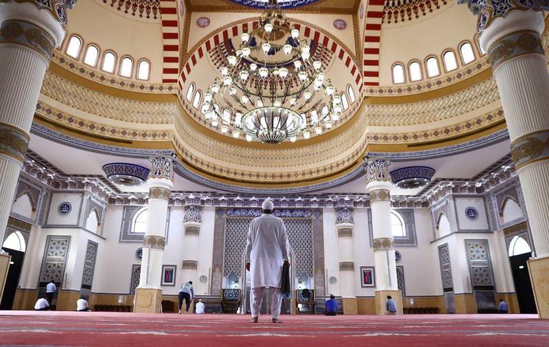 Men pray at Al Farooq Omar bin Al Khattab Mosque in Dubai during Ramadan, a month-long celebration of self-purification and restraint. Getty
