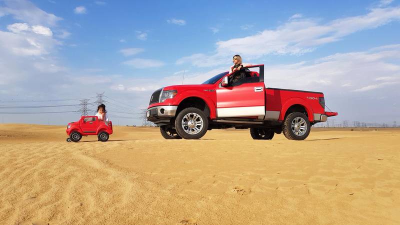 Shomyza Shamrez and her daughter Delylah Rizwan with the family's Ford F-150 truck and a toy truck. Shomyza Shamrez