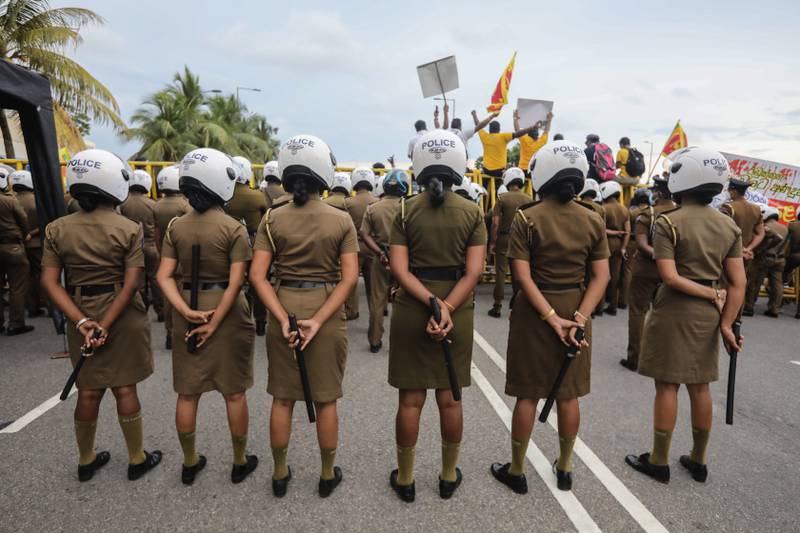 Sri Lankan police during a protest at the Presidential Secretariat in Colombo, in April. EPA