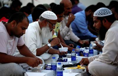 epa06759065 Muslims break their fast after sunset during the Islamic Holy month of Ramadan, in Dubai, United Arab Emirates, 23 May 2018 (Issued 24 May 2018). Muslims around the world celebrate the holy month of Ramadan by praying during the night time and abstaining from eating, drinking, and sexual acts during the period between sunrise and sunset. Ramadan is the ninth month in the Islamic calendar and it is believed that the revelation of the first verse in Koran was during its last 10 nights.  EPA/ALI HAIDER