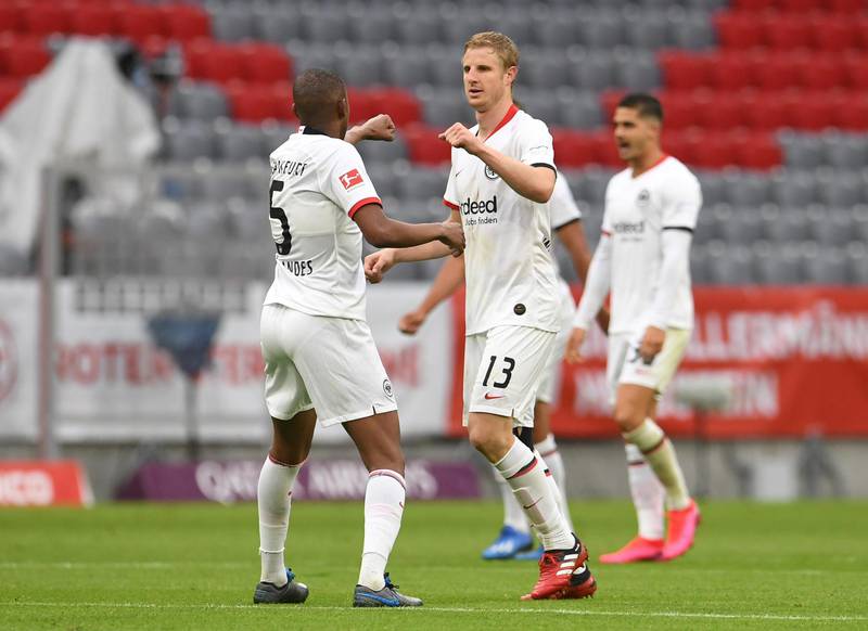 Eintracht Frankfurt's Martin Hinteregger celebrates scoring their second goal with Gelson Fernandes. Reuters