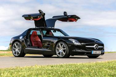 The Mercedes-Benz SLS AMG of 2010 sports majestic gullwing doors 