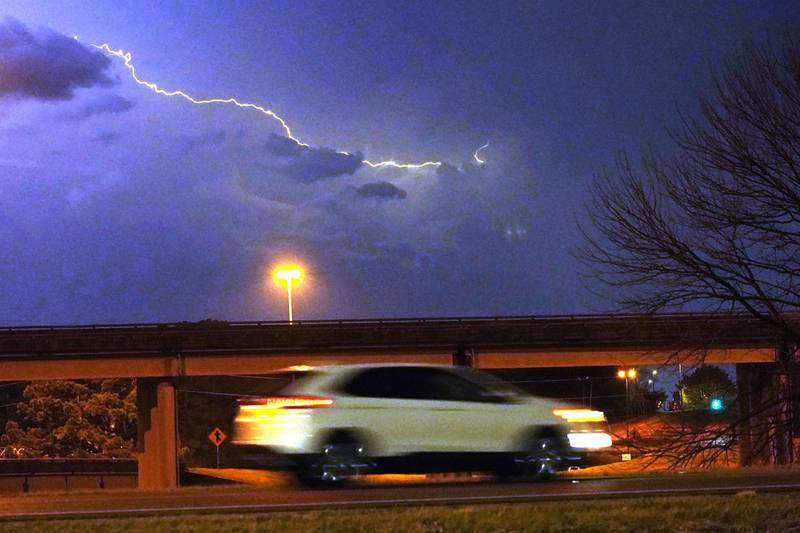 Lightning streaks across the sky in Jackson, Mississippi, as portions of the southern US brace for a possible tornado. AP