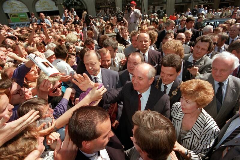 Gorbachev and his wife are greeted by cheering crowds in Bonn, Germany, in June 1989. EPA