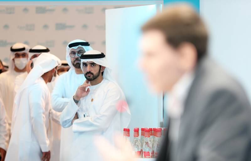 Sheikh Hamdan bin Mohammed, Crown Prince of Dubai, and Mohammed Al Gergawi, Minister of Cabinet Affairs, listen to 'ethical hacker' David Colombo speak at a session at the World Government Summit 2022. Pawan Singh / The National