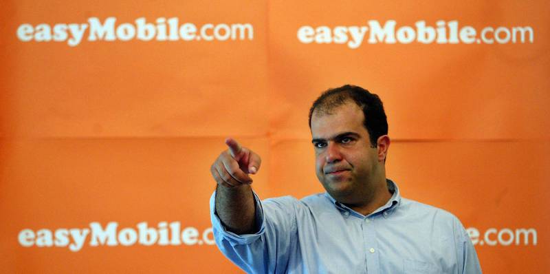 LONDON - AUGUST 10:  Easygroup founder Stelios Haji-Ioannou hosts a press conference announcing the launch of Easymobile.com at the Foreign Press Association on August 10, 2004 in London.  The new arm of the low-budget company will provide sim cards to consumers with economical tariffs for use in unlocked mobile phones. (Photo by Bruno Vincent/Getty Images)