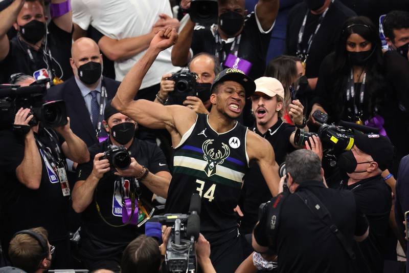 Giannis Antetokounmpo of the Milwaukee Bucks celebrates after defeating the Phoenix Suns in Game Six to win the 2021 NBA Finals at Fiserv Forum in Milwaukee, Wisconsin.