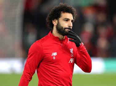 Mohamed Salah warming up before the game between Liverpool and Everton. PA
