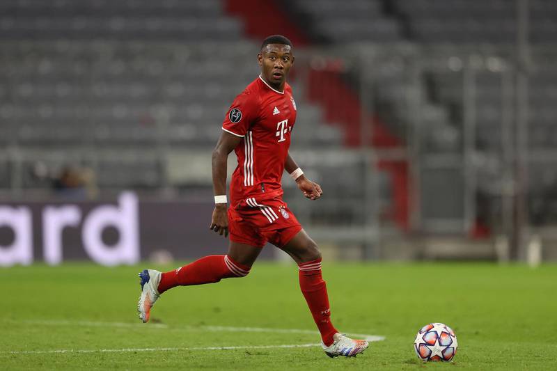 MUNICH, GERMANY - OCTOBER 21: David Alaba of FC Bayern MÃ¼nchen runs with the ball during the UEFA Champions League Group A stage match between FC Bayern Muenchen and Atletico Madrid at Allianz Arena on October 21, 2020 in Munich, Germany. (Photo by Alexander Hassenstein/Getty Images)