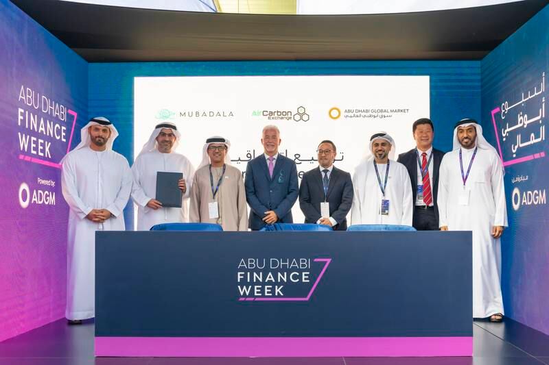 The agreement was signed by Badr Al Olama, executive director, UAE Clusters at Mubadala; Dhaher Bin Dhaher, chief executive of Registration Authority at ADGM; and William Pazos, managing director of AirCarbon Exchange. Source: ADGM