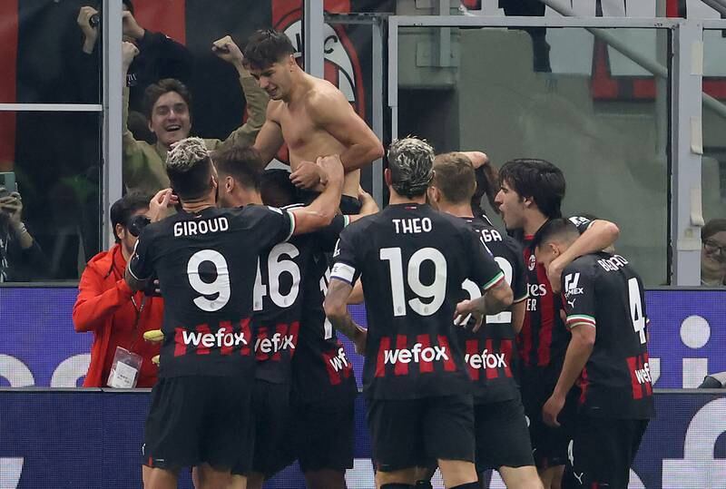 Brahim Diaz celebrates with AC Milan teammates after scoring the second goal against Juventus. EPA
