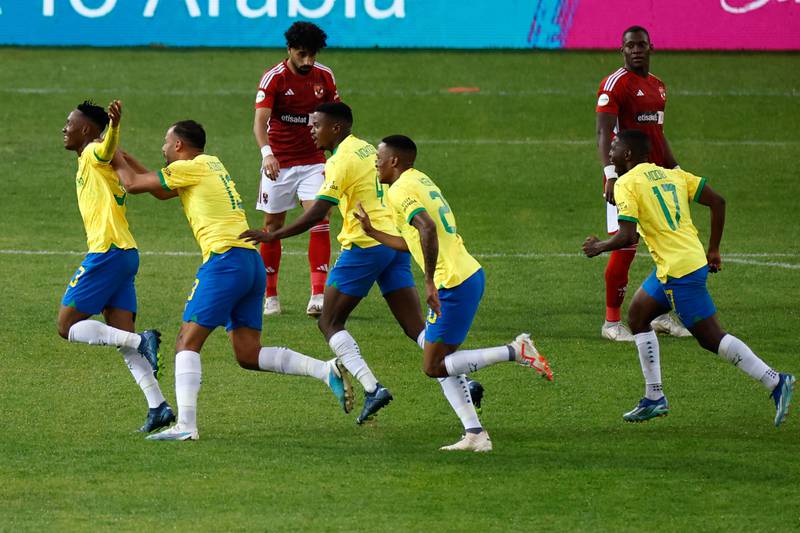 Mamelodi Sundowns midfielder Thapelo Maseko celebrates with teammates after scoring against Al Ahly during the African Football League semi-final first leg match in Pretoria. AFP