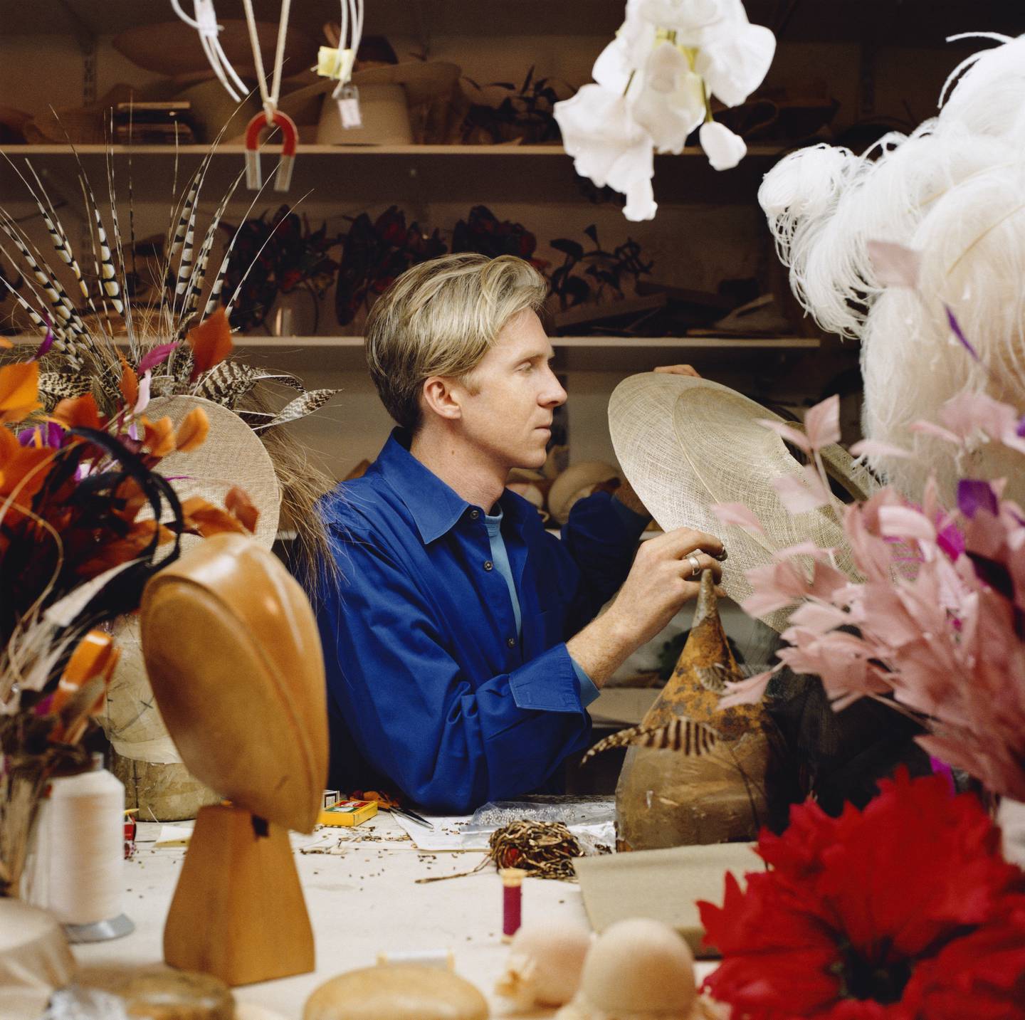 Milliner Philip Treacy, who has made hats for several members of the British royal family, in his workshop. Photo: Philip Treacy