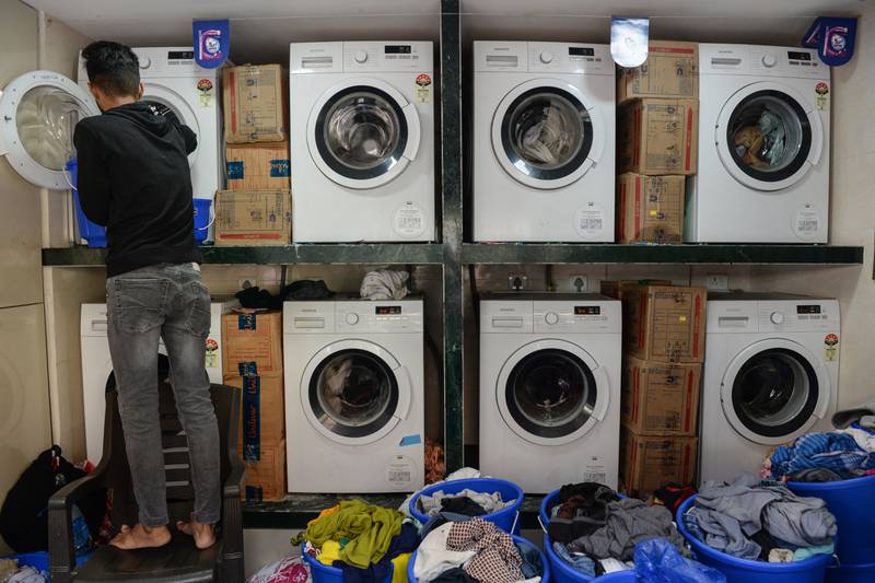 While washers and dryers arguably have wheels, they definitely have doors. AFP