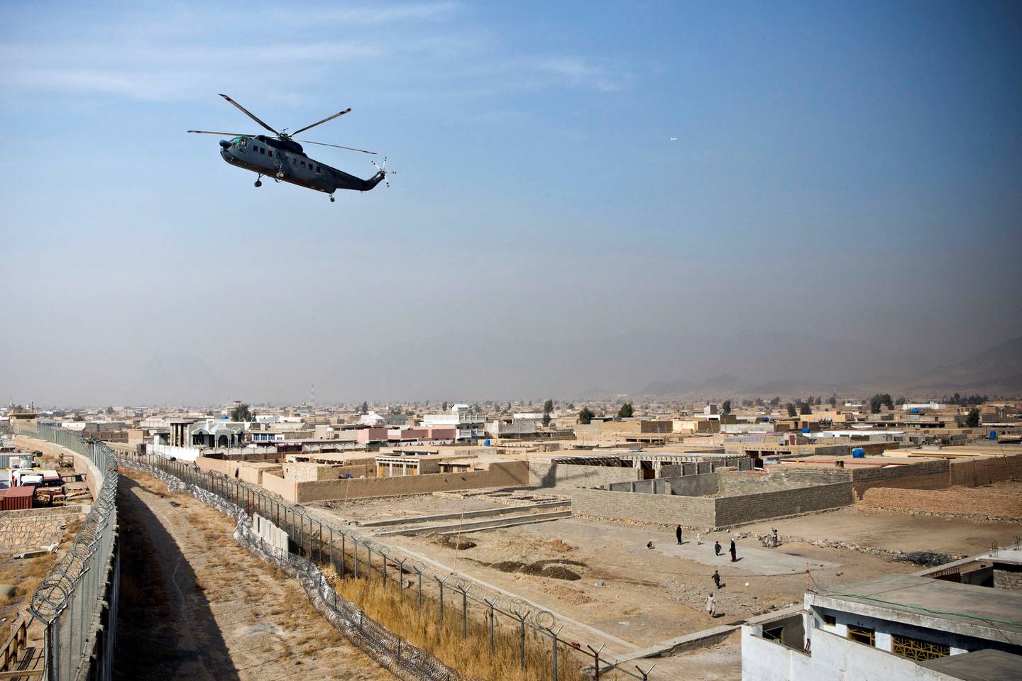 A military helicopter lands at Camp Nathan Smith in Kandahar City, Afghanistan. Reuters.