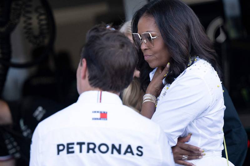 Former US First Lady Michelle Obama visits the Mercedes garage. AFP