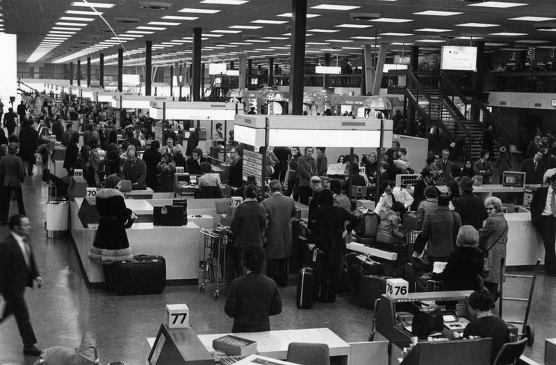 Passengers going through the departure lounge at Heathrow in 1973.