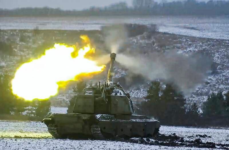 A Russian self-propelled 152. 4 mm howitzers fires during battle at an undisclosed location in Donetsk region, Ukraine.  Russian Ministry of Defence / EPA