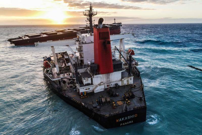 (FILES) In this file photo taken on August 17, 2020 An aerial view taken in Mauritius shows the MV Wakashio bulk carrier, belonging to a Japanese company but Panamanian-flagged, that had run aground and broke into two parts near Blue Bay Marine Park. On July 25, 2020, a cargo ship loaded with thousands of tonnes of fuel ran aground off Mauritius, beginning the worst environmental disaster ever witnessed in the tiny Indian Ocean archipelago.
Two months later, Mauritius is still taking stock of the damage after its rich fishing grounds and sensitive marine habitats were befouled with oil, and public anger simmers over the government's handling of the crisis. / AFP / -
