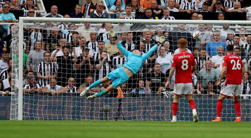Newcastle's Callum Wilson scores their second goal past Forest's Dean Henderson. Action Images