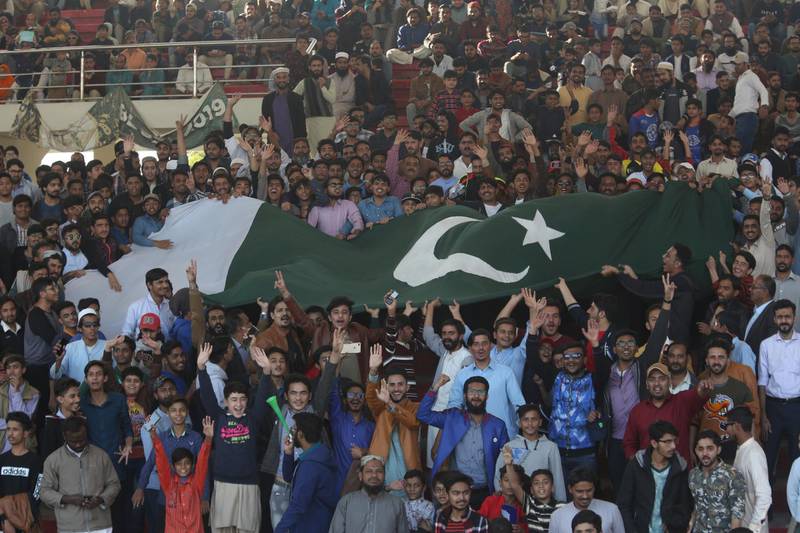 Pakistan fans celebrated the return of Test cricket to the country after a gap of 10 years. AP