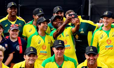 Former Indian player Sachin Tendulkar (centre L) and West Indies player Brian Lara (centre-R) pose for a selfie after a celebrity cricket match to raise funds for people affected by the Australian bushfires, in Melbourne on February 9, 2020. -- IMAGE RESTRICTED TO EDITORIAL USE - STRICTLY NO COMMERCIAL USE -- / AFP / WILLIAM WEST / -- IMAGE RESTRICTED TO EDITORIAL USE - STRICTLY NO COMMERCIAL USE --
