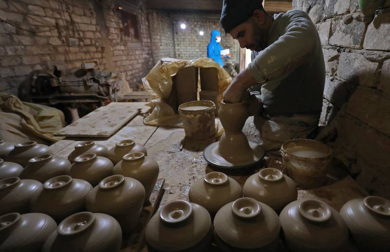 A potter works at a ceramics workshop in the town of Gharyan, about 100km (60 miles) south-west of the capital Tripoli. All photos: AFP