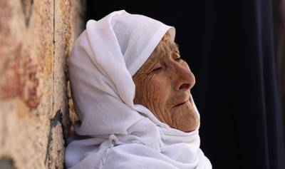 Mohammed Hamayel's grandmother grieves at his funeral in the village of Beita near Nablus city.  EPA