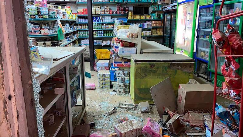 A damaged shop in Jazan, south-west Saudi Arabia, after a projectile fired by Houthi rebels in Yemen hit the area. SPA via AP