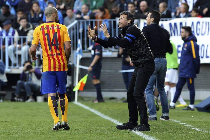 Barcelona manager Luis Enrique gives instruction to Javier Mascherano during the team’s La Liga match on Saturday. Dani Perez / EPA