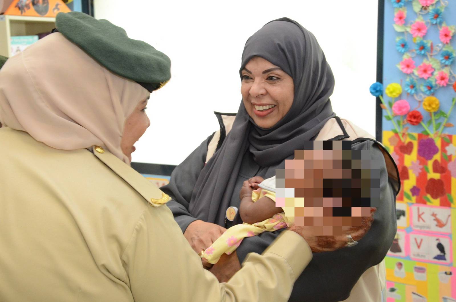 Dubai Police provide winter clothing for children of women prisoners