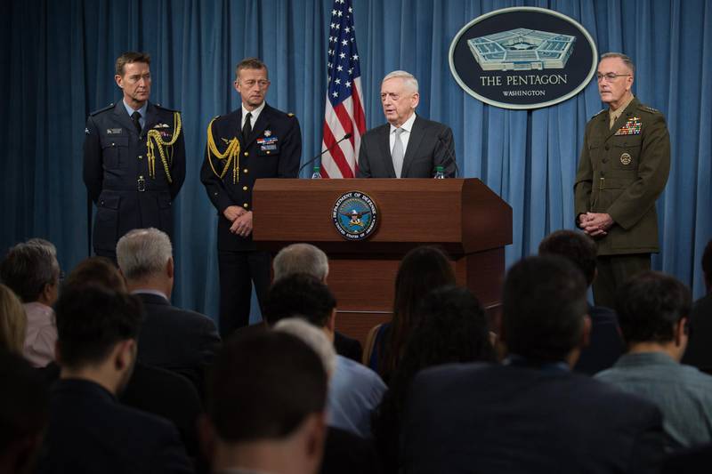 US Defense Secretary James N. Mattis and the Chairman of the Joint Chiefs of Staff, Marine Gen. Joseph F. Dunford, Jr., briefing reporters on the current US air strikes on Syria during a joint press conference at the Pentagon in Washington. Sgt. Amber Smith / EPA